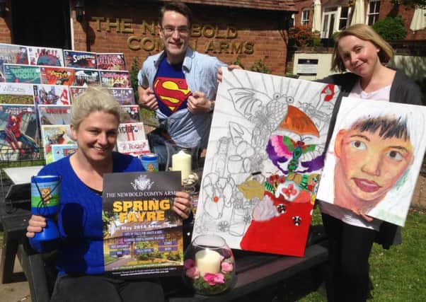 All the fun of the fair with (left to right) Sarah Miller of the Newbold Comyn Arms, Edward Ellis from Elysium Comics and Jessica Mallorie from Art Group Studies.