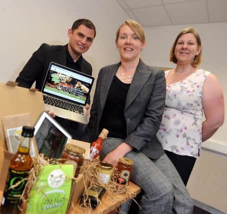 Martin Jarvis, Sarah Jolley and Liz Burkinshaw with an Artisan Food Discovery box.