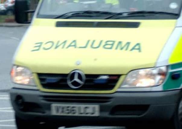 An ambulance carried the patient to hospital after fire crews carried the patient from the boat