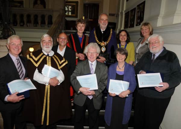 Leamington Mayor's Annual Awards 2013/14 recipients Mike Wilkinson, Alan Griffin, Chris Johnson, Margaret Moore and Beresford King-Smith are pictured with Cllr. Amanda Stevens (Deputy Mayor), Cllr. John Knight (Mayor) and Cllr. Judith Clarke (outgoing Mayor) plus Mayor's Charity Fund recipients Nigel Adams (Myton Hospice) and Deb Bignell (Warwickshire Young Carers Project). NNL-140524-170342009
