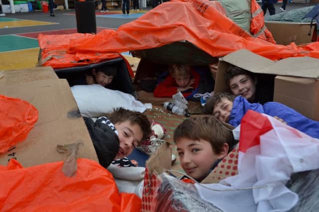 Pupils at Warwick School taking part in a 'sleep-out' to raise funds for homelessness charity Emmaus.