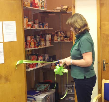 Diana Mansell, the Trussell Trust's West Midlands regional development officer, opens the Southam Fosse Foodbank at the Graham Adams Centre in Southam.