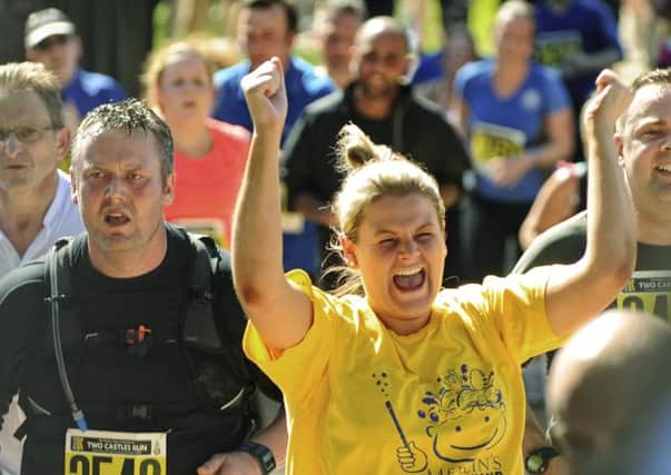 The annual 'Two Castles' run took place on Sunday, with over 4,000 entries raising money for charity. The run started at Warwick Castle and finished at Kenilworth Castle. NNL-140806-211936009
