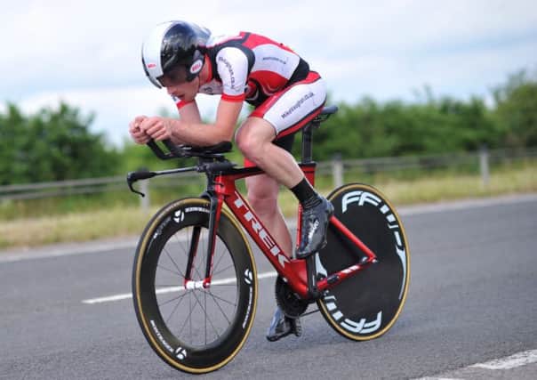 Matt Clinton guides his bike and its deflating back tyre to victory at the Hemel Hempstead CC 10-mile TT. 
Picture: T wo Wheels Good Photography