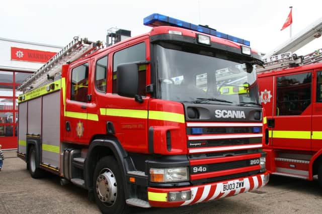 Firefighters were called to release two people who were trapped in their car following a crash in south Leamington.