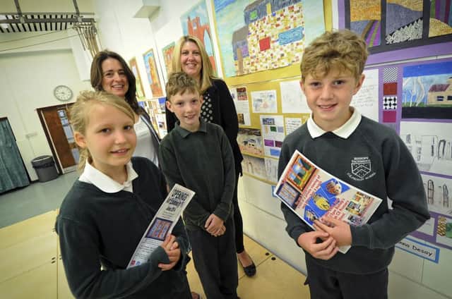 Bishops Tachbrook Primary School pupils with their artworks.