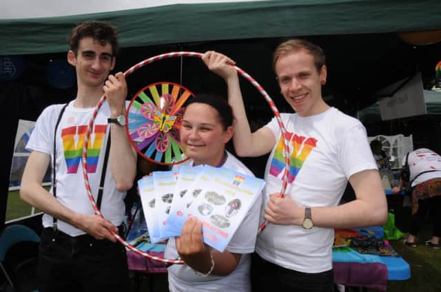Morgan, Lisa and Rex from Push Projects at the Warwickshire Pride festival in Leamington.