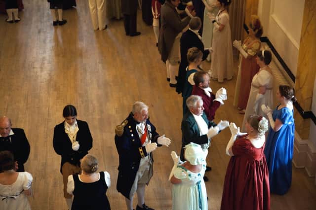 Guests take part in Regency-style dancing at the Regency Ball at the Pump Room. Picture by Catherine McLoughlin.