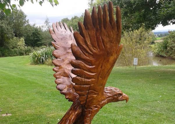 A wood carving sculpture by Graham Jones.