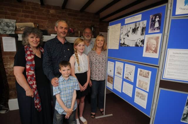 Simon Colbeck with his wife Elaine and children Megan and Alec at the exhibition, with Cardall Collection chairman Bernard Cadogan and exhibition curator Val Brodie.