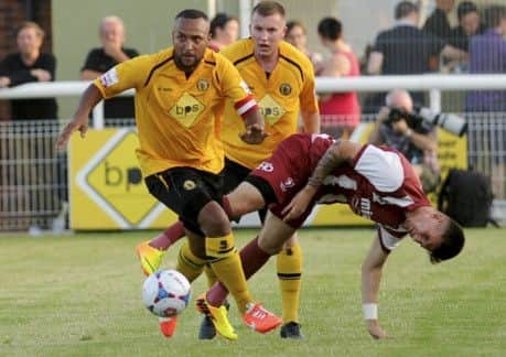 Richard Batchelor, who opened the scoring at Stratford, brings the ball away during last Fridays clash with Cheltenham. Picture: Mike Baker