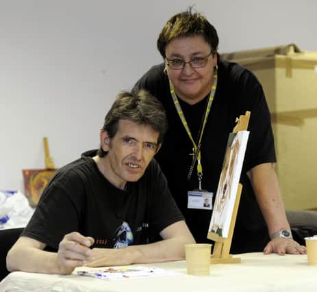 Former addict Mike Smith with Lorraine Warren of the Recovery Partnership, who set up the art group at ESH Works.