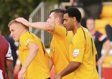 Jordan Goddard is congratulated after notching against Cheltenham.