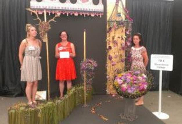 Warwickshire College students receive their Silver Medal at the RHS Tatton Flower Show.