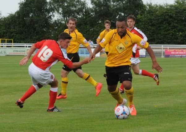 Richard Batchelor drives at the heart of the Walsall defence during Saturdays friendly clash. Picture: Morris Troughton