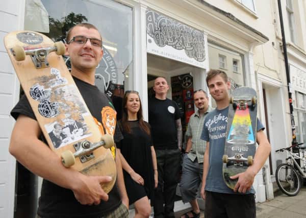 Alex Walker (left) of Warwickshire Association of Youth Clubs and Chairman of 'Save Our Skate Park', is working alongside Ripride Skateshop in Leamington to raise awareness of the campaign to have a new skate park built in Victoria Park. He is pictured with Samantha Fawke (Accountant) and  Mark Taylor, Chris Swan and Jack Robison (Trustees). MHLC Skate Park 26-07-14 NNL-140728-104322009