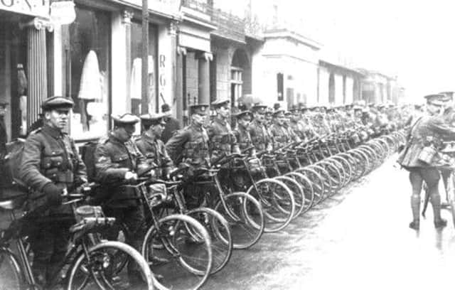 Gloucester Cycle Regiment lined up with their bicycles in the Parade, Leamington.