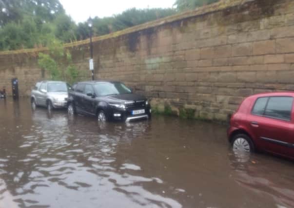 Flooding b y Castle walls in Warwick last Thursday