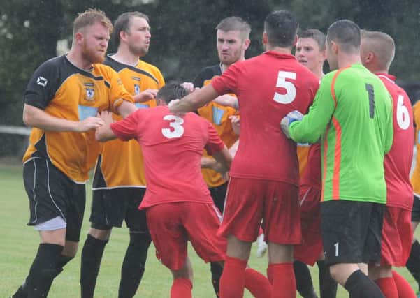 Tempers fray during Racing Club Warwicks 2-0 home defeat to Lichfield City. Picture: Morris Troughton