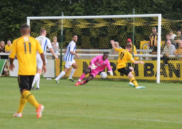 Danny Newton goes close against Nuneaton, only to be denied by Reice Charles-Cook. Picture: Morris Troughton