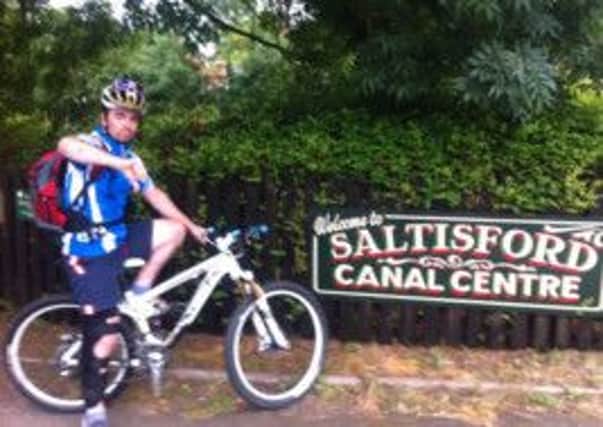 Andrew Robson, temporarily disabled cyclist outside Saltisford Canal Centre.