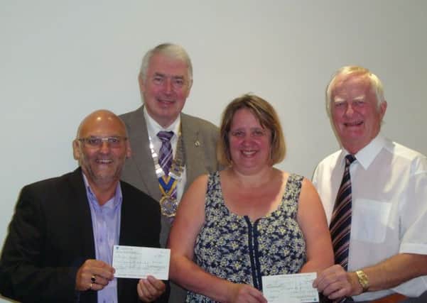 Nigel Adams (The Myton Hospices' community fundraiser, Graham Snape (Leamington Rotary president), Debbie White (Chairman of the Warwickshire Fight for Sight committee)  and Clive Stone (vice-president of Fight for Sight).