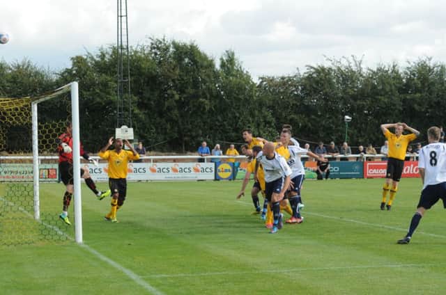 Stuart Pierpoint goes close with a header against Guiseley. Picture: Morris Troughton