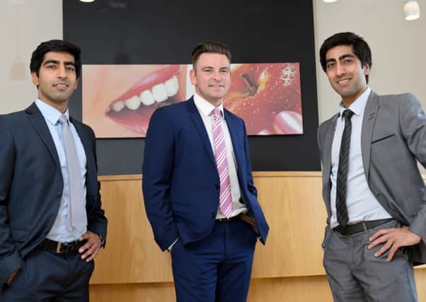 RBS Corporate Banking - The Grove Practice, Leamington Spa. 8th August 2014.
Upen (left) and Viren Vithlani pictured with RBS Bank Manager Spencer Ford.
Picture by Simon Hadley
www.simonhadley.co.uk/ 07774 193699