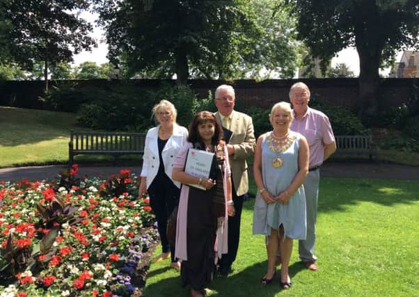 Heart of England judges Nicola Clarke (second left) and Roger Bache in Pageant Gardens with town councillor Mandy Littlejohn (left), mayor Moira-Ann Grainger and town clerk Derek Maudlin (right).