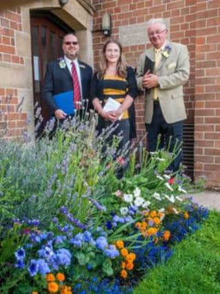 Jennifer Wharton, new chairman of Wellesbourne In Bloom committee with judges from Heart of England in Bloom competition.