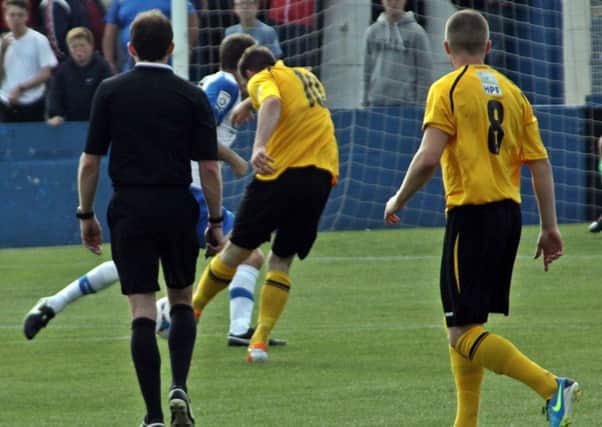 Danny Newton fires home the opener for Brakes at Barrow - report on page 80. Picture: Sally Ellis