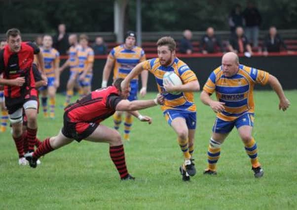 Jim Canning tests the Newbold defence during Old Leamingtonians 31-5 Midlands Two West defeat. Picture: Tim Nunan.