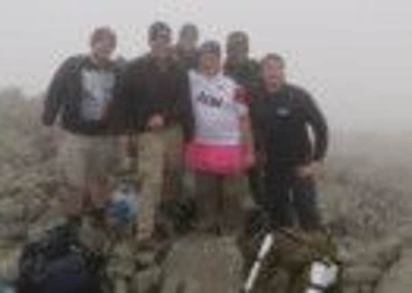 Some of the Baxi employees who rached the misty top of Scafell Pike