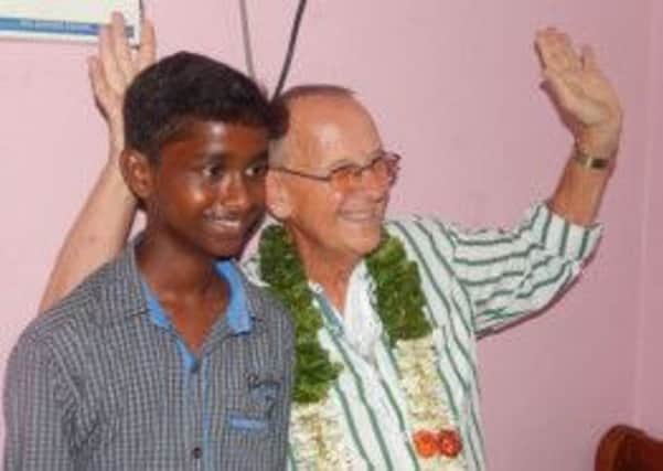 Prakash and Warwick grandfather Mike Gage who sponsors his eduction in India.