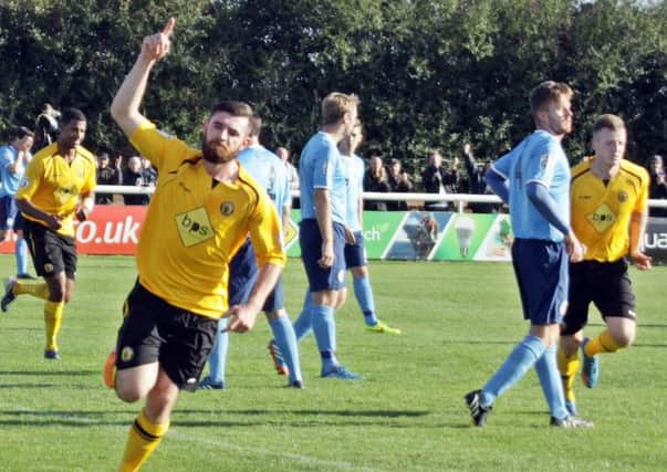 Danny Newton celebrates the first of his two goals. Picture: Sally Ellis