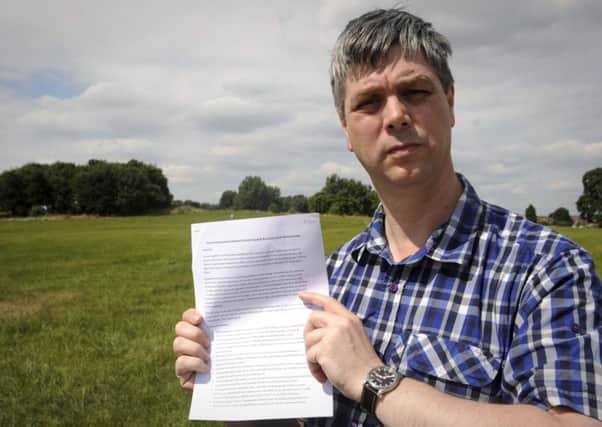 Nigel Hamiitlon, a long standing campaigner for saving the common land on Warwick Racecourse, has discovered a secret agreement between the district council and the Jockey Club, in which the council offers to hand over the land to the Jockey Club. NNL-140729-210548009