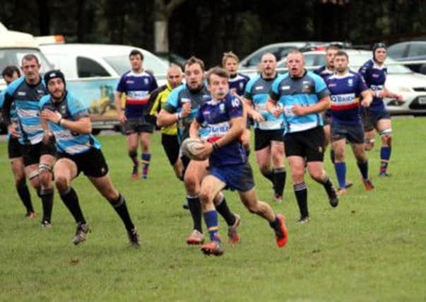 Leamington fly-half Gus Gillespie looks for support against Bridgnorth. Picture: Gina Ruyssevelt