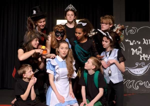 Dress rehearsal for Alice in Wonderland at Myton High School, Warwick. NNL-141120-092518009