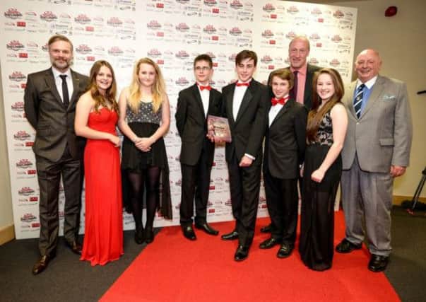 Warwickshire Hunt Pony Club celebrate their Junior Team of the Year award.