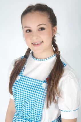 Katie Maxwell as Dorothy in Stratford Musical Theatre Company's production of The Wizard of Oz.