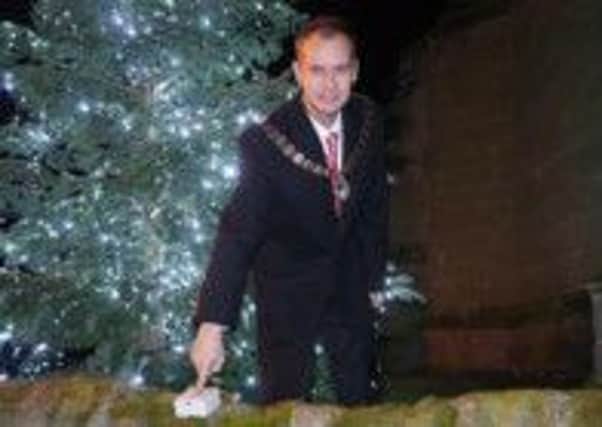 Whitnash Mayor Cllr Robert Margave switches on the town's Tree of Light.