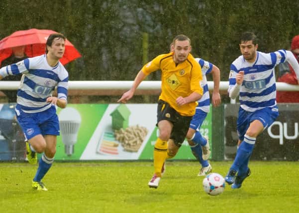 Lee Moore attacks at pace for Leamington in their 4-0 win over Oxford City.