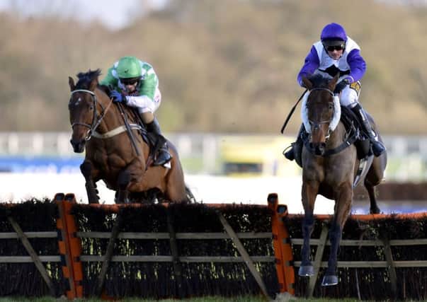 Flintham on his way to victory in the Foundation Developments Novices Handicap Hurdle at Ascot. Picture: PA
