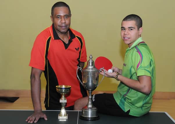 Laurence Sweeney, right, and father Earl both picked up trophies at the county championships in Warwick.