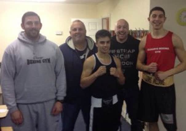 Clearys boxers Danny Quartermaine and Lewis Williams with coach Jamie Bannister, Quartermaines dad Pip and Edwin Cleary. Picture submitted