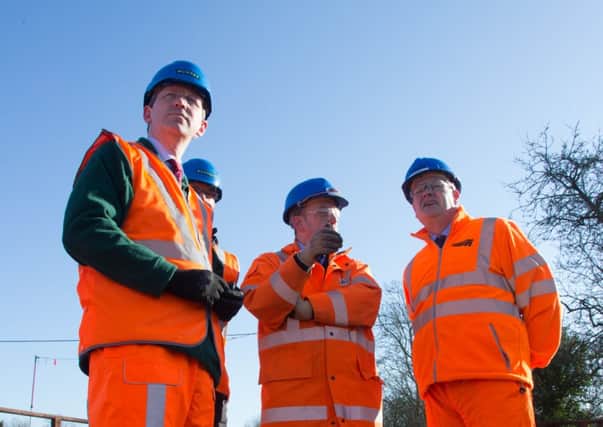 MP, Jeremy Wright with Network Rail engineers at the Harbury landslip site.