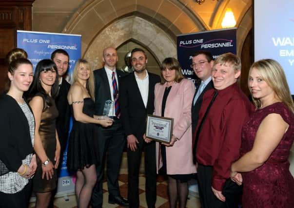 Kenilworth Rehoming Centre, pictured with Philip Hibble of the Leamington Courier, won the Team of the Year Award.