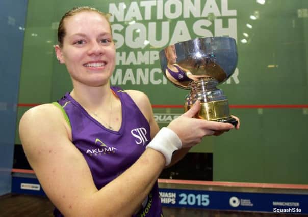 British champion Sarah-Jane Perry celebrates with her trophy. Picture: Steve Cubbins (www.SquashSite.co.uk)