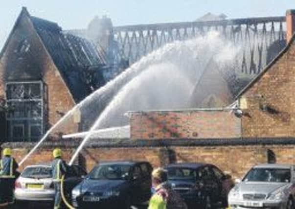 Firefighters tackle the blaze at the former All Saints School when it was home to Bath Place Community Venture in 2009.