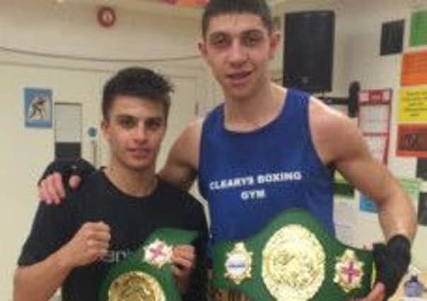 Danny Quartermaine and Lewis Williams show off their Central England belts. Picture submitted